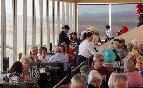 Party Guests Enjoying a Day at the Race Track